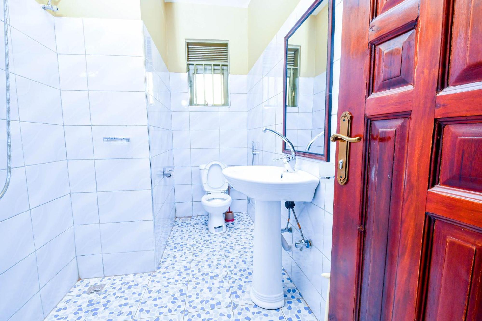 Peace Of Mind Suites Энтеббе Экстерьер фото