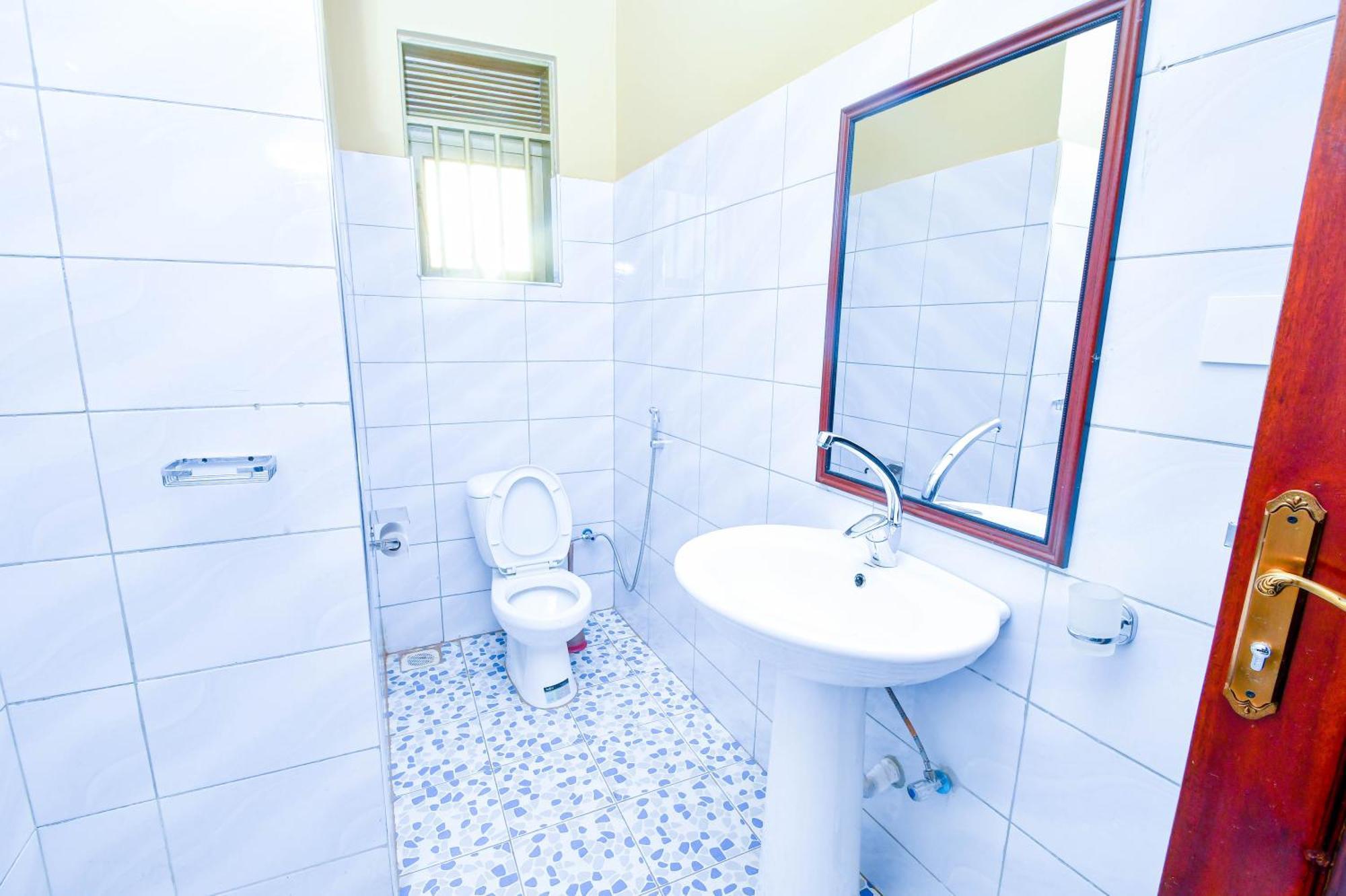 Peace Of Mind Suites Энтеббе Экстерьер фото