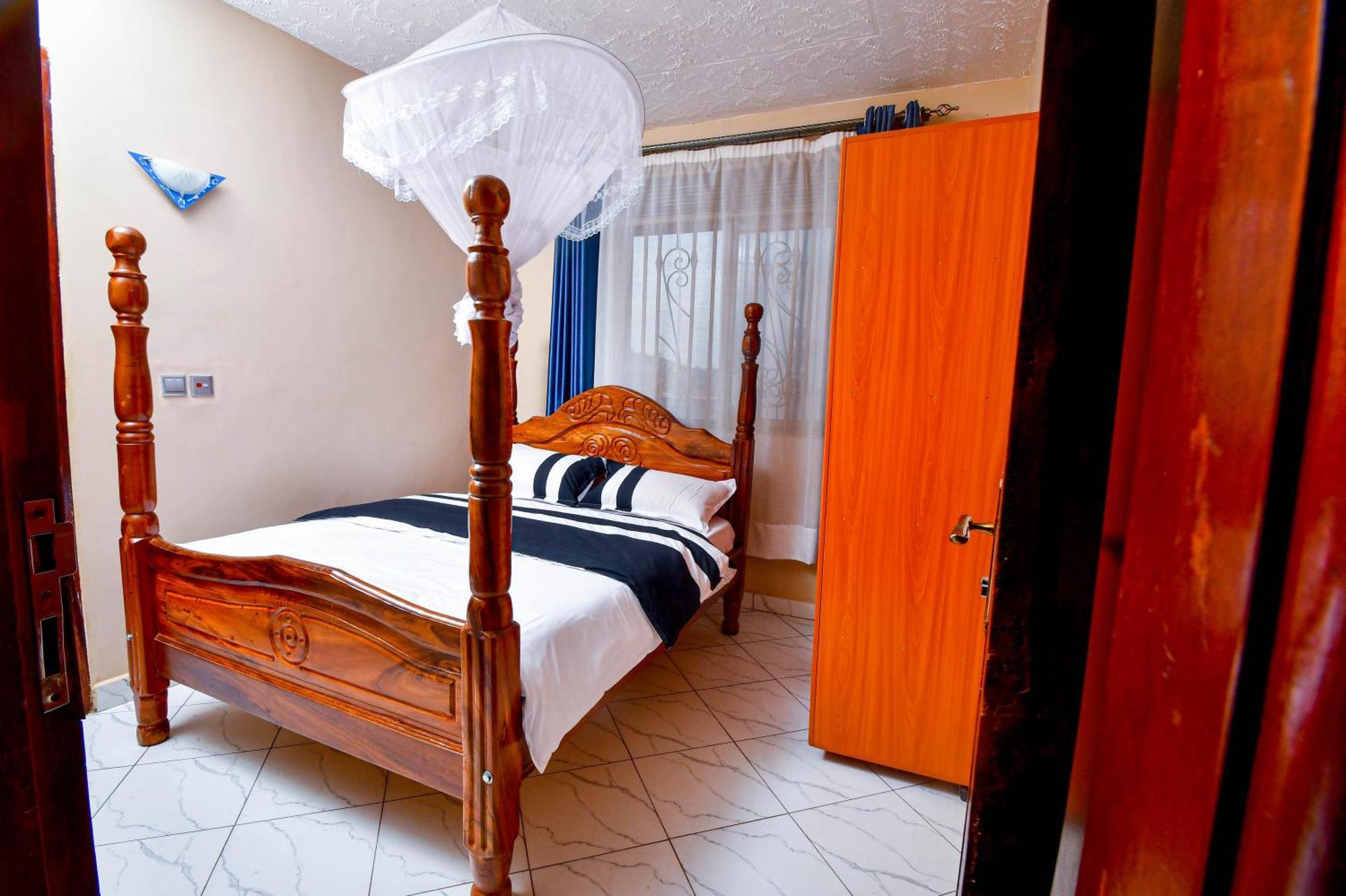Peace Of Mind Suites Энтеббе Экстерьер фото